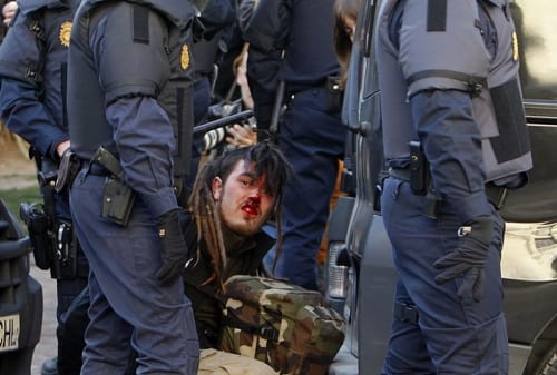Violent Spanish police slammed Violent Spanish police slammed