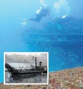 Divers explore the wreck of the 482, while (inset below) the boat in its heyday