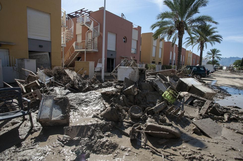 Spanish homeowners dealing with fires and floods will have to pay