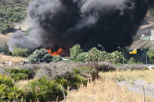 Expat group on guard for fires Expat group on guard for fires