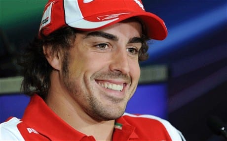 Fernando Alonso signs with McLaren-Honda Fernando Alonso signs with McLaren-Honda