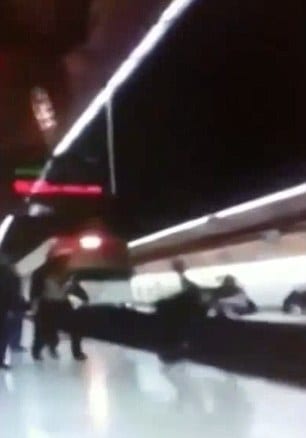 VIDEO: Shocking moment police officer dragged under train at Madrid station VIDEO: Shocking moment police officer dragged under train at Madrid station