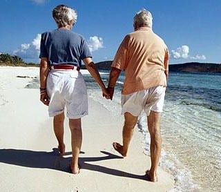 Expat pensioners on beach e