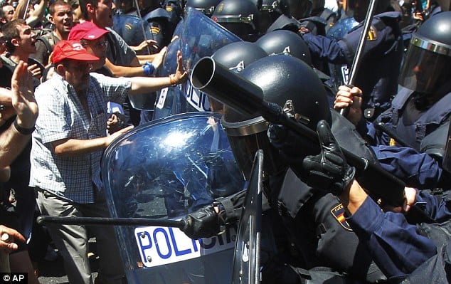 demonstrators clash with police in madrid