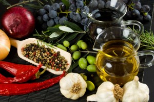 Extra virgin olive oil and balsamic vinegar with mediterranean food ingredients