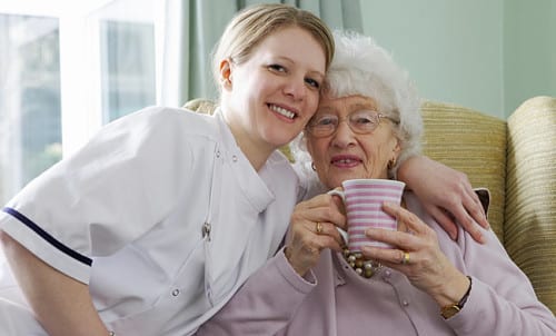 lady with tea and nurse e