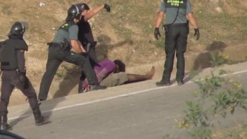 spanish police beat migrant unconscious melilla border fence e