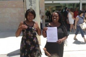 HAPPY FAMILY: Stacie and mother Veronica outside Velez-Malaga court. COPYRIGHT OLIVE PRESS SPAIN