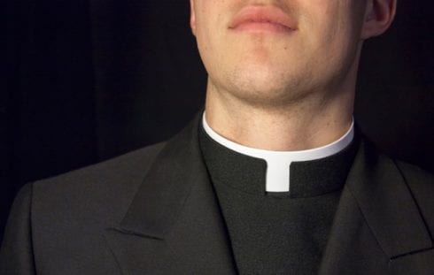 MI Catholic priest collar istock e