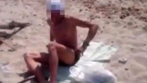FLASHED: Woman shames beach perv