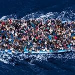 migrants in boat