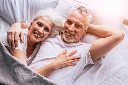 Senior Couple Couple In Bed Couple Holding Couple Smiling Smiling Happy