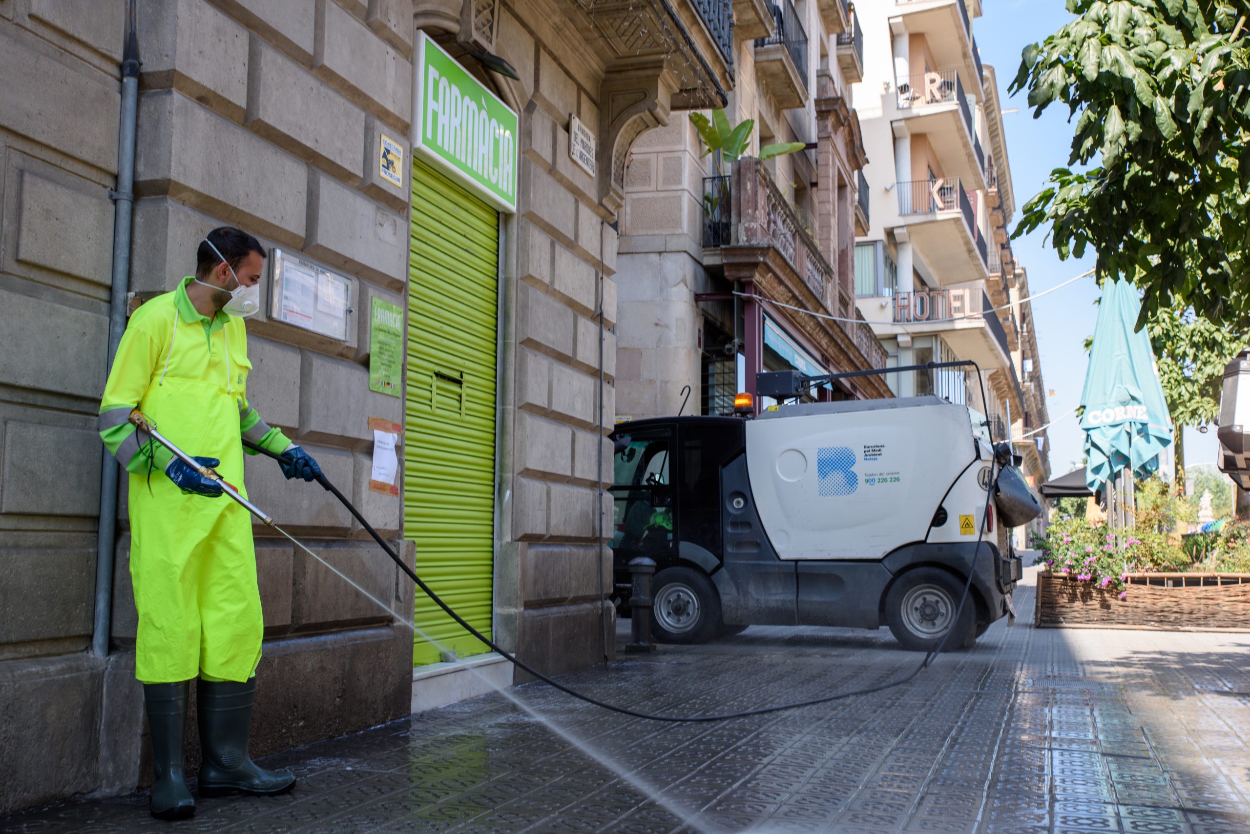 Barcelona Street Cleaning Team Disinfects Area Around Pharmacy  7