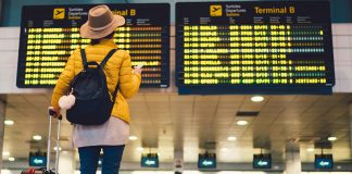 LATEST: Spain removes UK from COVID-19 risk list and will allow travellers in from May 24 WITHOUT a PCR test Tourist At Barcelona International Airport