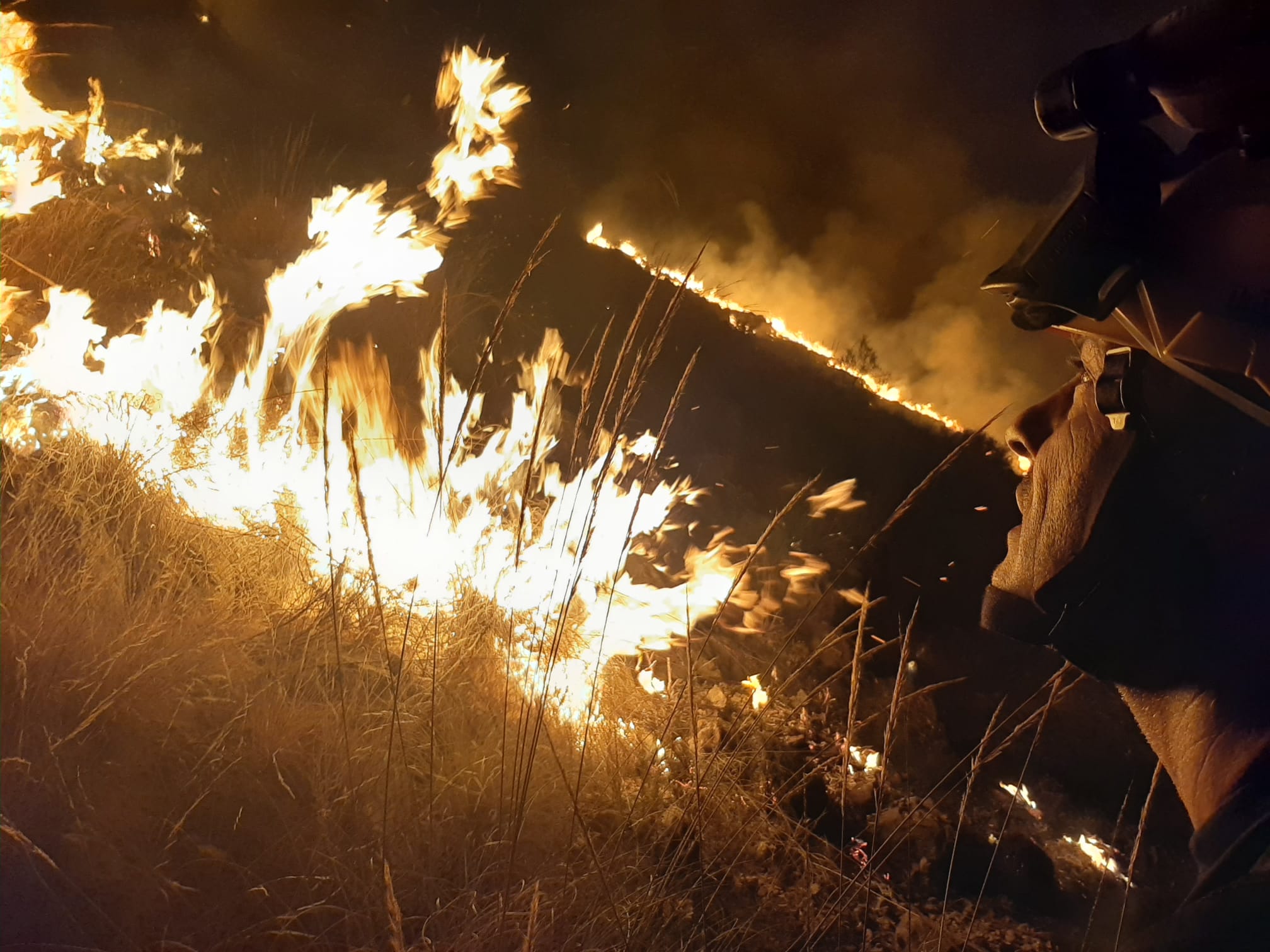 Firefighters Clamber Up Hillside To Battle Blaze On Spain  S Costa Blanca