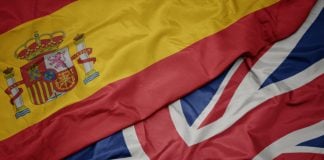 Beat the looming tax deadline for British non-resident property owners in Spain with Spanishtaxesonline.com Waving Colorful Flag Of Great Britain And National Flag Of Spain