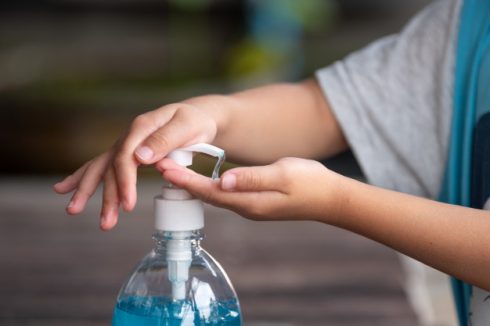 Child Hands Using Wash Hand Sanitizer Gel Pump Dispenser_28961 101