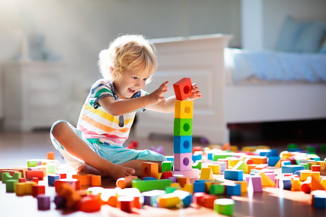 Child Playing With Colorful Toy Blocks  Kids Play