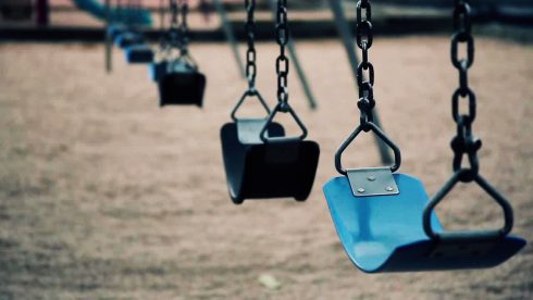 Empty Playground Swings