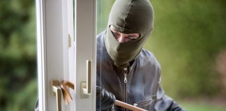 Tired burglar grabs a nap on a sofa after stealing a TV set from a Vigo area home in Galicia, Spain Burglar Grabs A Nap On A Sofa After Stealing A Tv Set From A Vigo Area Home In Galicia, Spain