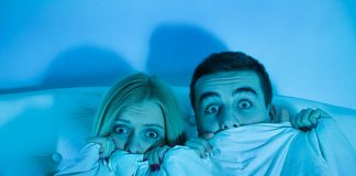 Scaremongering! Spanish Wealth Tax – your Pensions & Investments. Frightened Couple Watching A Horror Movie
