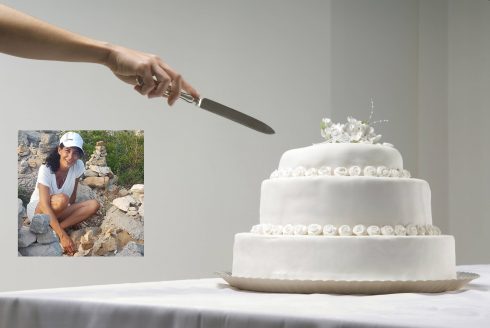 Woman Cutting Wedding Cake