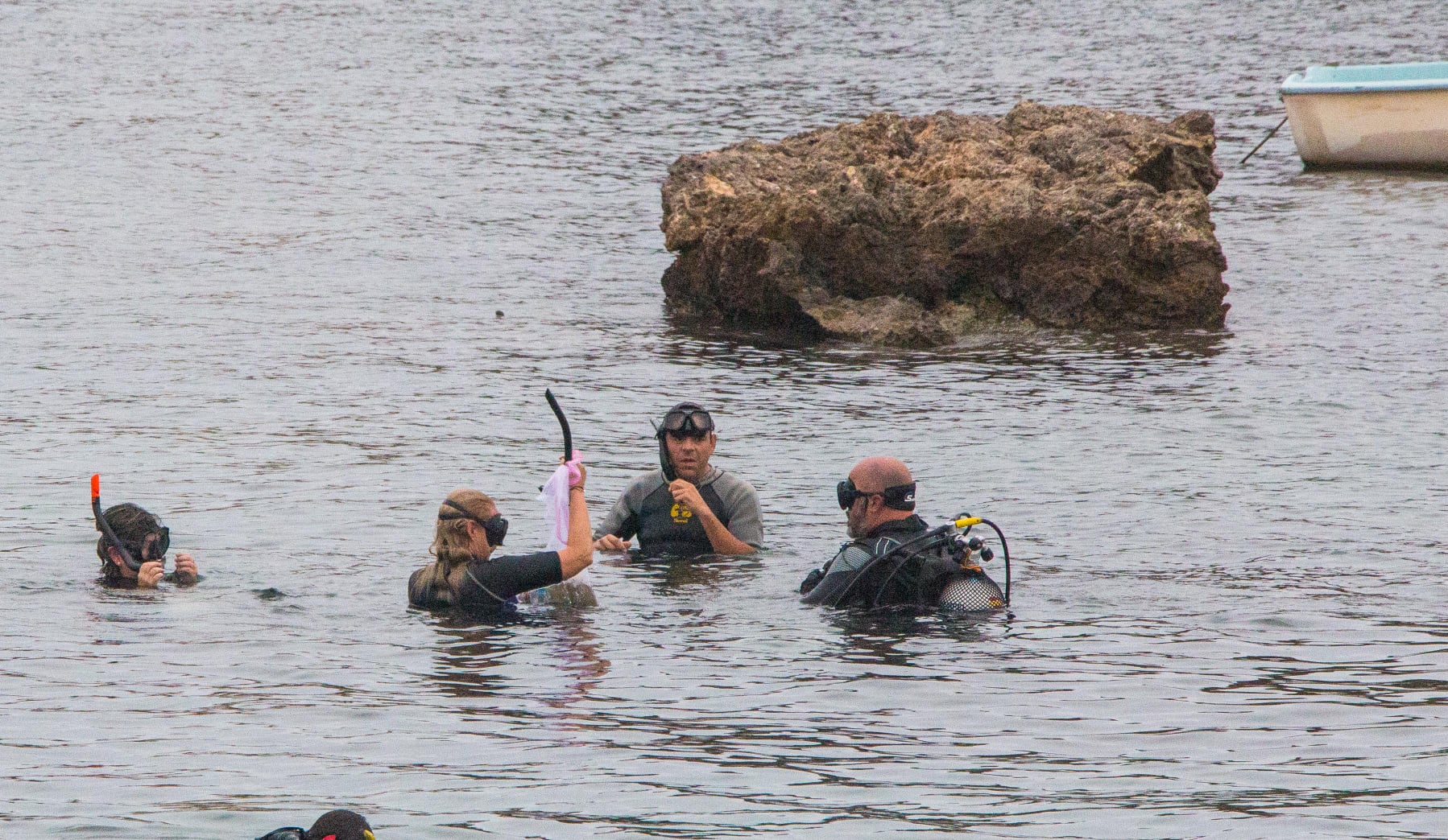 Divers remove trash dumped in waters off the smallest populated island in Costa Blanca area of Spain