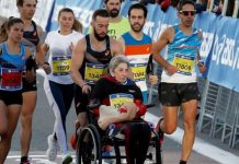 Amateur runner breaks world the record for pushing mum in wheelchair for 26 miles at Barcelona Marathon Eric Domingo Pushing His Mother In A Wheelchair During The Barcelona Marathon 1068x601