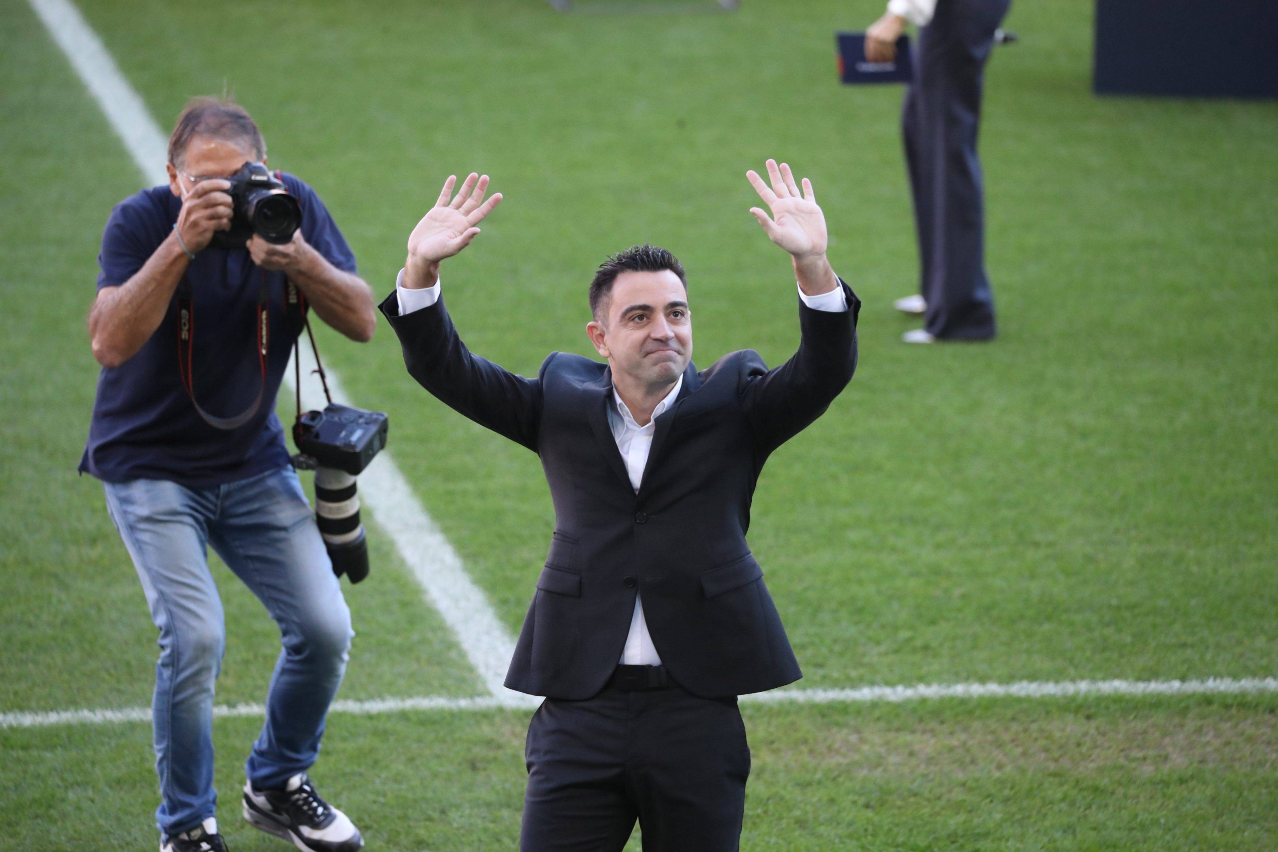 Xavi introduced as new Barcelona coach to over 9,000 fans at the Nou Camp in Spain