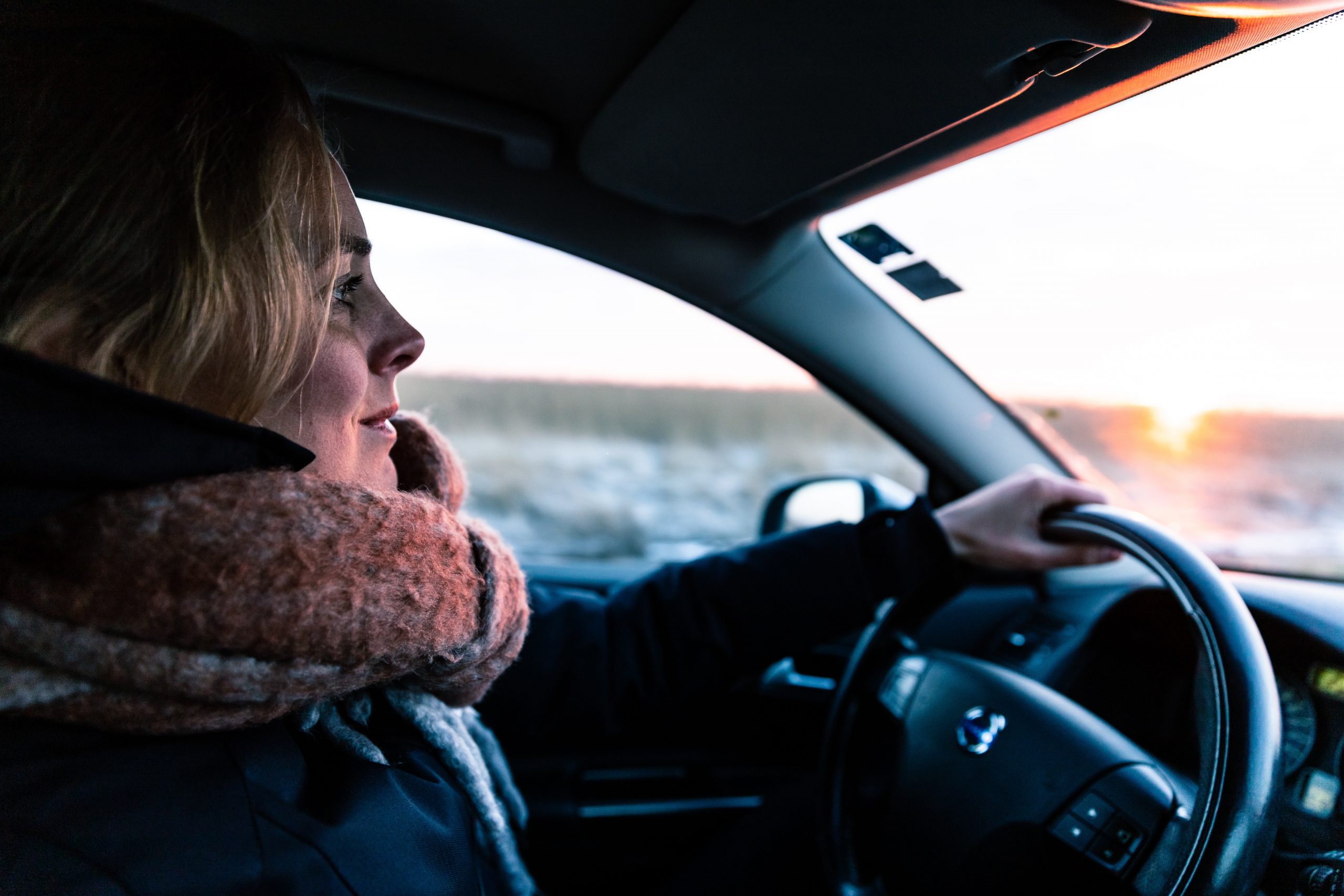 coat car driving Photo by Jantine Doornbos on Unsplash