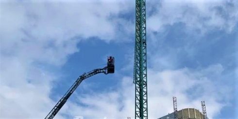 Man threatens death leap off construction crane but is talked down by police in Spain's Murcia City