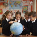 Bsm Primary Ks2 Group Of Students Looking At Globe Miltbt Up3avs