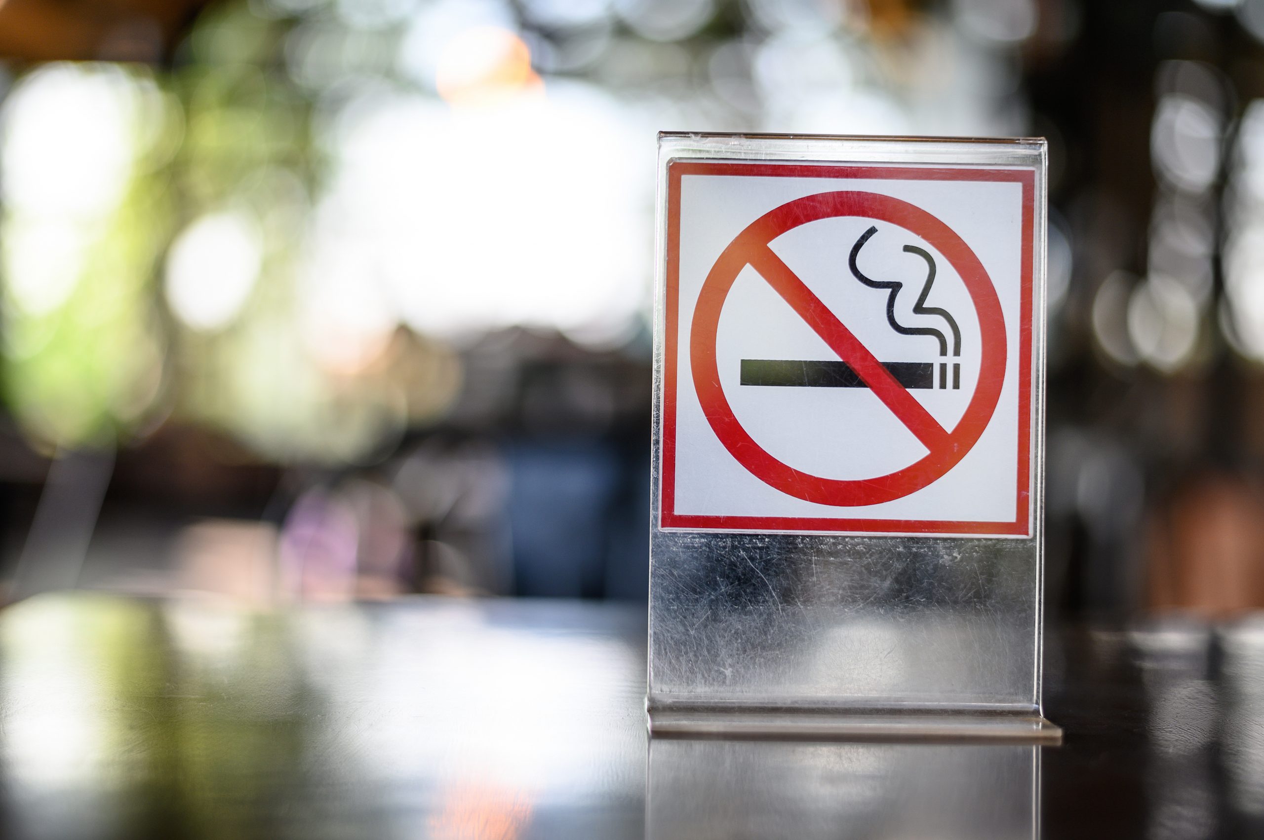 No Smoking Sign On Wooden Table In Coffee Shop Don't Smoking Pla