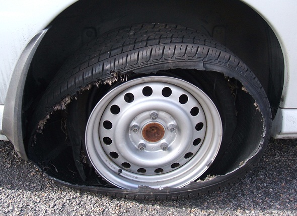 Burst Tyre Reveals Overloaded Van Crammed With Stolen Iron On Costa Blanca Motorway In Spain.