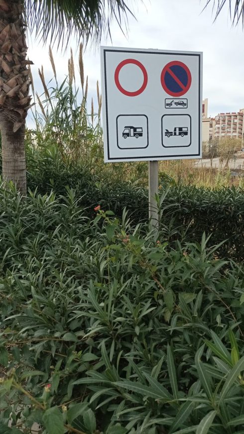 Sign of Confusion: Disgruntled residents complain about caravans parked around the mouth of the River Torrox – but what does the warning sign really mean?