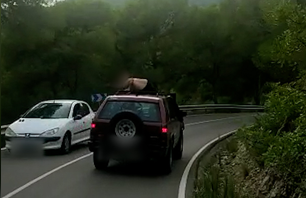 Police Arrest Man Who Sat Semi Naked On Car Roof During Mountain Road Trip In Spain's Valencia
