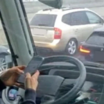 Bus driver using mobile phone