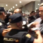 Scuffles between Spanish riot police and Peruvian footballers