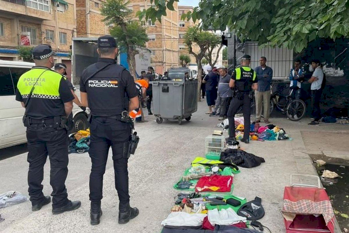 Police Clear Away Dozens Of Illegal Street Vendors Operating On One Street On Spain's Costa Blanca