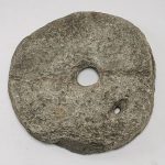 Young boy discovers possible Roman-origin millstone on beach in Spain’s Almeria