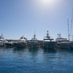 Body of woman 'aged between 50 and 60' found floating in waters of upmarket port in Spain's Mallorca.