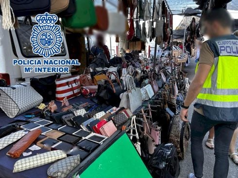 Tourists conned by Benidorm street market traders selling thousands of fake-branded clothes on Spain's Costa Blanca