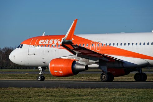 Drunk British tourist is arrested for trying to open plane door during easyJet flight to Spain