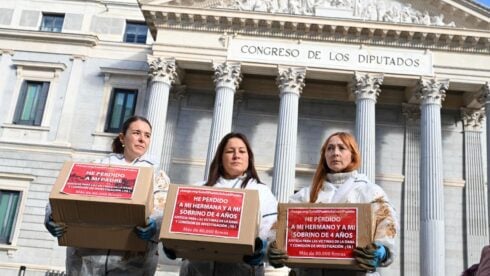 Families of Valencia flood victims present petition to Spain's politicians calling for inquiry into slow response to disaster
