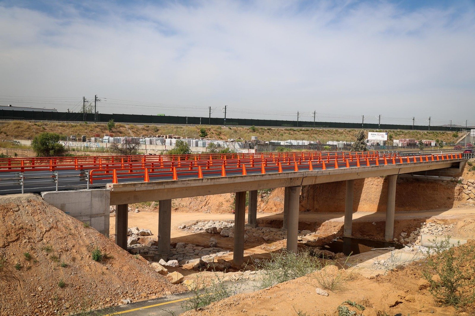 Key Valencia road- with two new bridges- reopens seven months after flood disaster