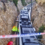 Motorist's miracle escape after car drops off bridge into path of oncoming tram on Costa Blanca