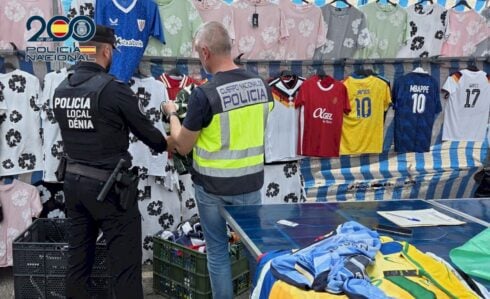 Popular Costa Blanca street market raided with 12 traders arrested for selling fake football shirts ahead of the World Cup