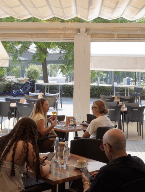 A group of customers at a cafe in San Pedro de Alcantara