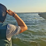 Guardia Civil officer pursuing a narco boat