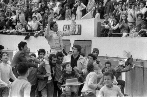 Paquirri the matador being lofted above by his fellow peers at a bullring in Spain